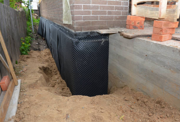 Happy homeowners after waterproofing job in Sunbright